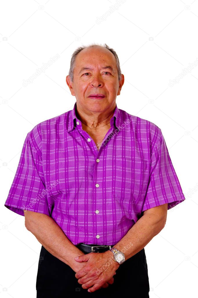 Portrait of old man with both hands in front, looking at camera and wearing a purple square t-shirt in a white background