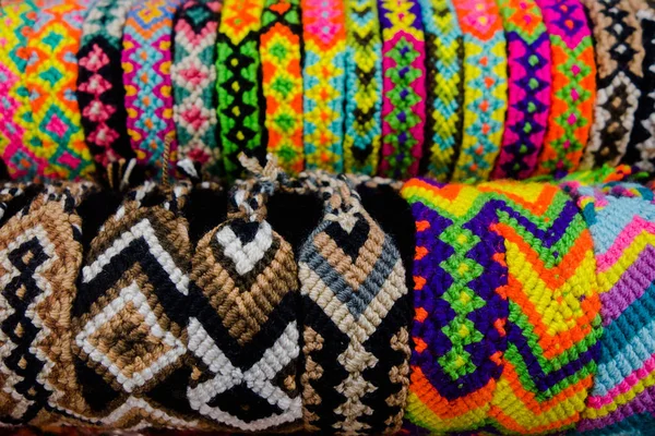 CARTAGENA, COLOMBIA - OCTOBER, 27, 2017: Close up pf colored colombian handcuffs in a public market in Cartagena — Stock Photo, Image