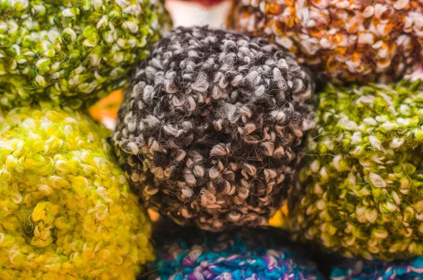 Close up of colorful wool yarn balls, wool toy to play, in a blurred background — Stock Photo, Image