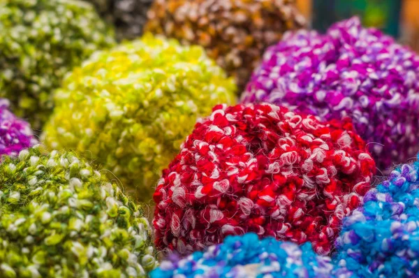 Close up of colorful wool yarn balls, wool toy to play, in a blurred background — Stock Photo, Image