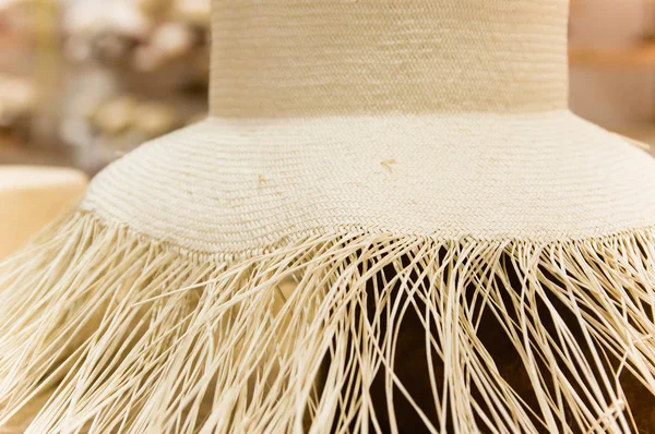 Close up of selective focus of handmade Panama Hat at at indoor market in Otavalo, Ecuador — стоковое фото