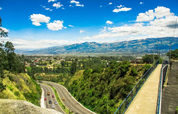 Aerial view of road in the mountains to visit the municipal dump in a beautiful day, in the city of Quito, Ecuador — Stock Photo, Image