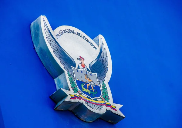 Quito, Ecuador - January 02, 2017: Outdoor view of a shield of UPC, comunitary police unit, with the logo in the wall of a building, located in the city of Quito, Ecuador — Stock Photo, Image