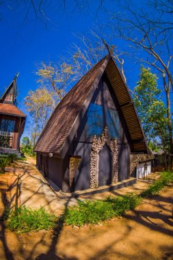 Baan Barajı Müzesi, Chiang Rai Tayland siyah evde çok sayıda ev açık görünümü