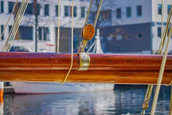 Close up of selective focus of ropes around mast support boom on boat in port of Alesund in Norway — Stock Photo, Image