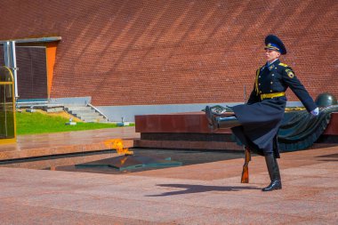 MOSCOW, RUSSIA- APRIL, 24, 2018: Single soldier marching of the Kremlin regiment changing the guard near the Tomb of the Unknown Soldier clipart