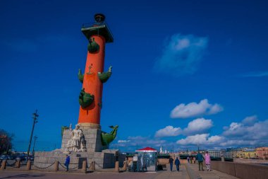 ST. PETERSBURG, RUSSIA, 01 MAY 2018: View of rostral columns in historical city center of Saint-Petersburg, popular touristic landmark, UNESCO World Heritage Site clipart