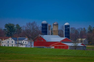 Pennsylvania, USA, APRIL, 18, 2018: Oudoor view of typical Amish farm in Lancaster county in Pennsylvania USA without electricity clipart