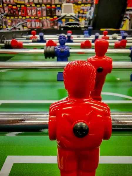 Foosball. Table with red and blue players detail perspective. — Stock Photo, Image