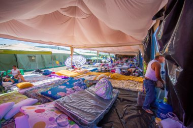 Portoviejo, Ecuador - April, 18, 2016: Tents for the refugees after 7.8 earthquake. clipart