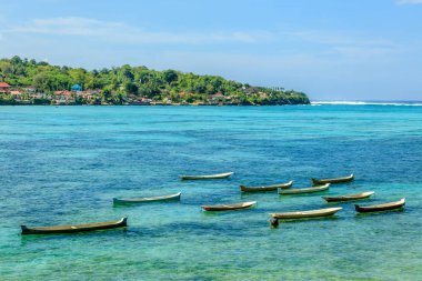 Wooden boats near the beach at Nusa Lembongan, Indonesia clipart