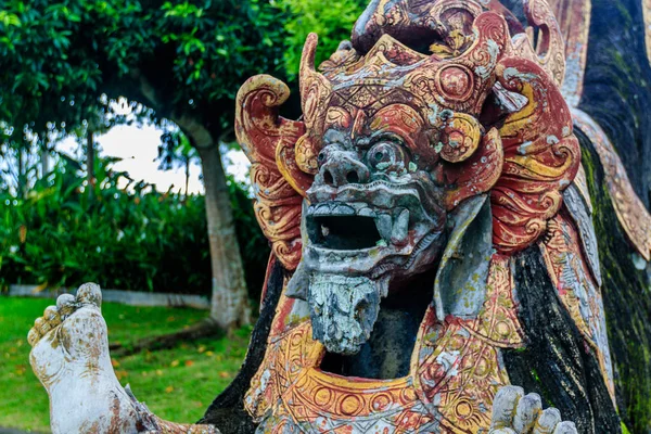 Demon statue at Tirta Gangga Water Palace, Bali Island, Indonesia