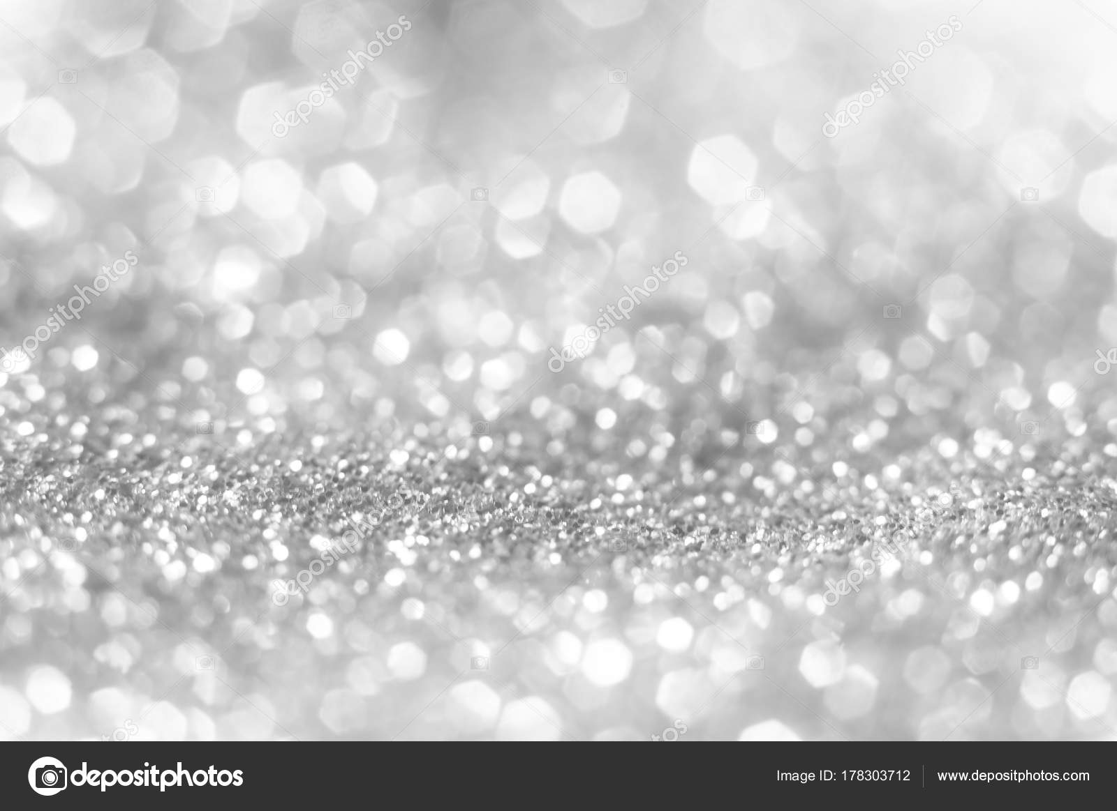 Abstract of Bright and sparkling bokeh background. silver and diamond dust  bokeh blurred lighting from glitter texture Stock Photo by ©fedoruk  178303712