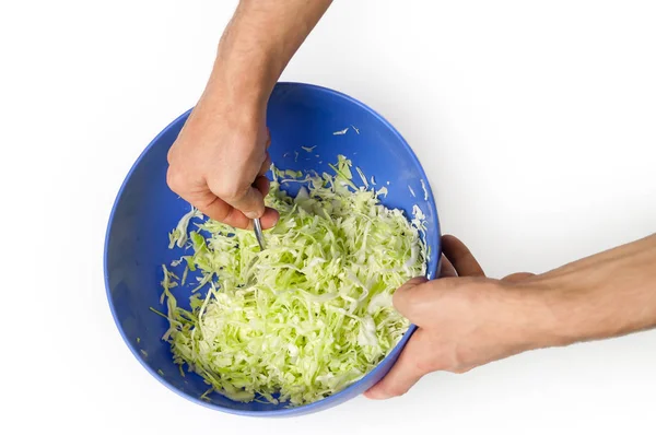 Hände des Kochs gemischten Salat von jungem Grünkohl. isoliert o — Stockfoto
