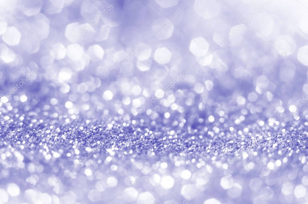 Soft violet or blue bokeh light is the soft blurred circles of light white and light purple