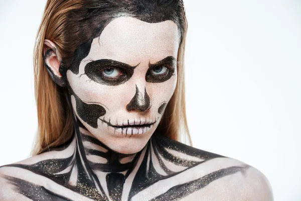 Woman with terrifying skeleton makeup