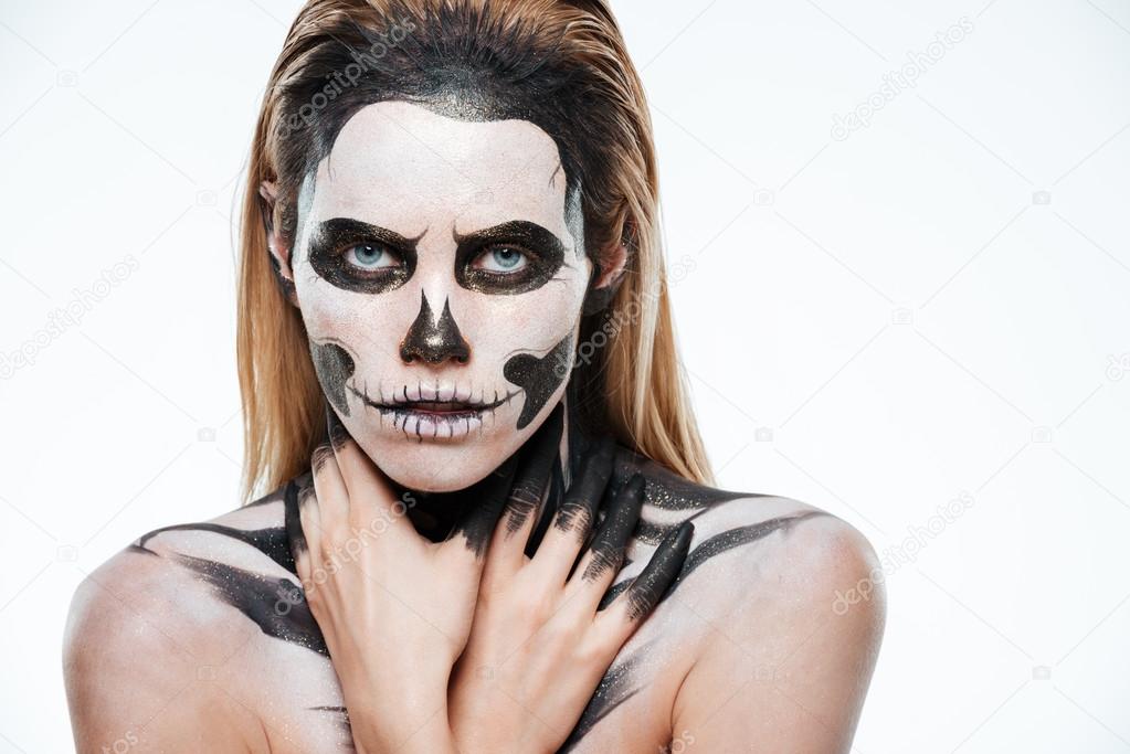 Portrait of girl with fearful skeleton makeup