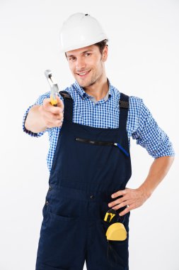 Mutlu genç adam Oluşturucusu'nda İngiliz anahtarı tutan kask