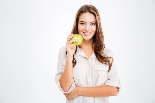Portrait of a happy young girl holding green apple — Stock Photo, Image