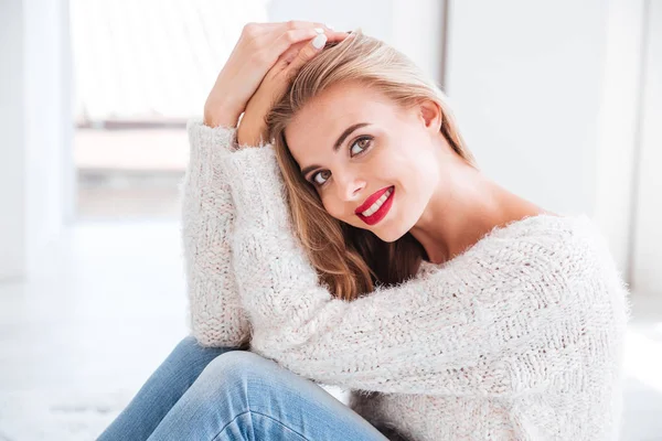 Close up portrait of woman wearing sweater and red lipstick — Stock Photo, Image