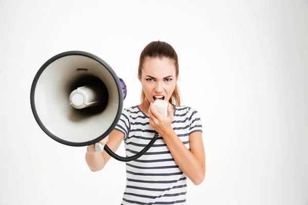 Mulher bonita gritando em megafone — Fotografia de Stock