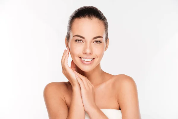 Beauty portrait of a young woman with skin care posing — Stock Photo, Image