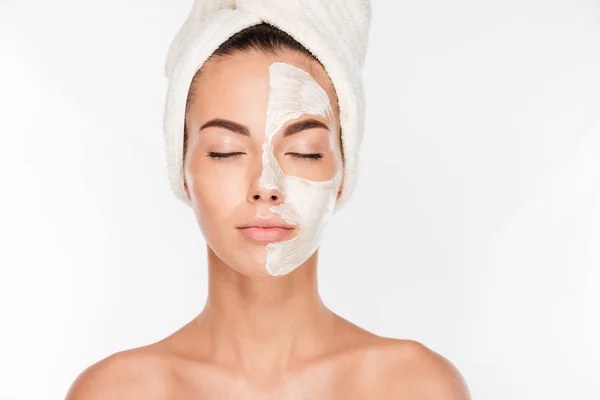 Young beautiful woman with facial mask — Stock Photo, Image