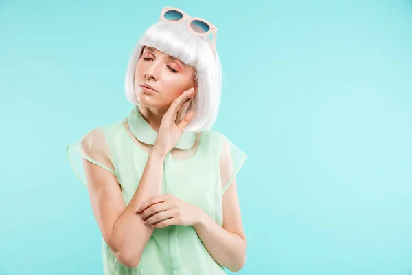 Sensual attractive young woman standing and touching her face — Stock Photo, Image