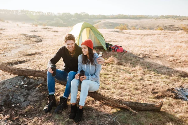 Young couple near the tent — Stock Photo, Image