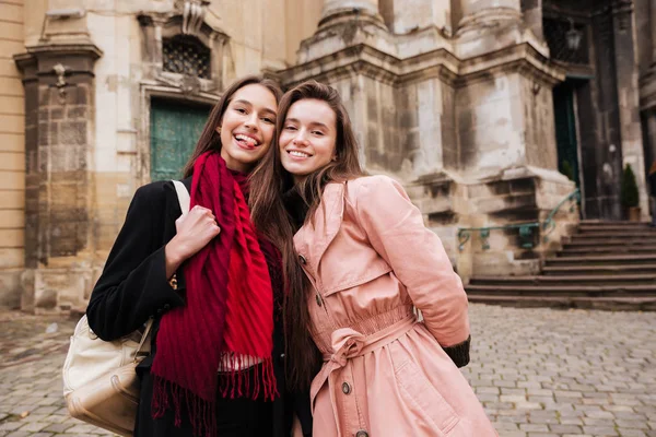 Image of beauty girls in coats — Stock Photo, Image