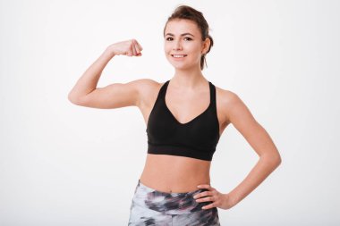 Onun pazı gösterilen genç fitness Bayan
