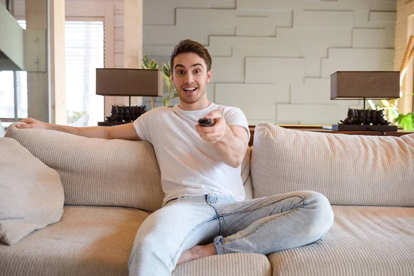 Portrait man with remote controller — Stock Photo, Image