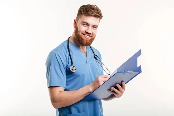 Portrait of a happy smiling doctor or nurse with stethoscope — Stock Photo, Image