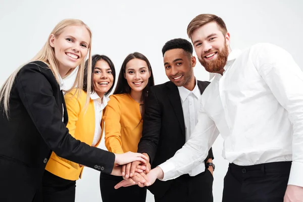 Cheerful colleagues business team standing in office — Stock Photo, Image