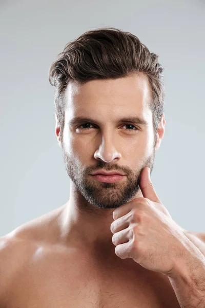 Portrait of a naked charming bearded man looking at camera — Stock Photo, Image