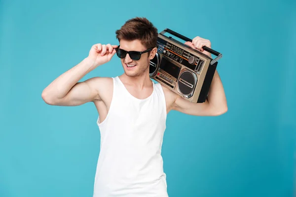 Happy man holding tape recorder — Stock Photo, Image