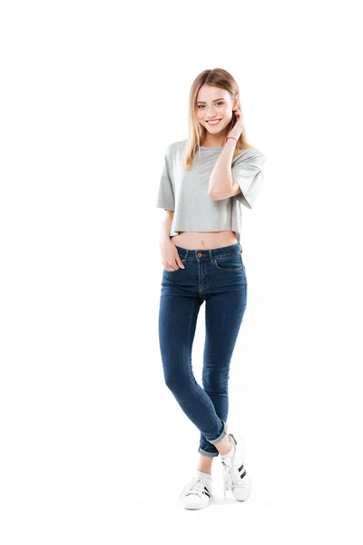 Full length portrait of a smiling young girl — Stock Photo, Image