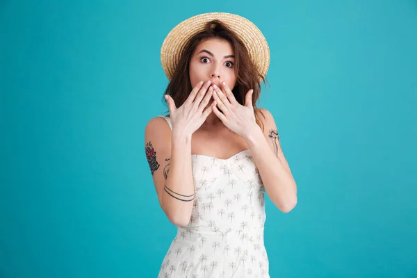 Summer girl covering mouth with hands and looking at camera — Stock Photo, Image