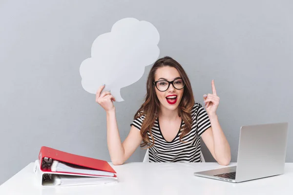 Happy young lady holding empty thoughts bubble have an idea — Stock Photo, Image