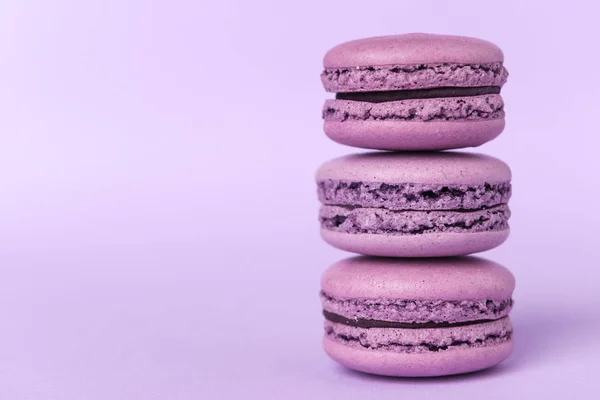 Three sweet purple macaroons