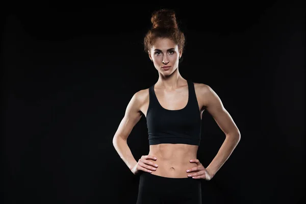 Concentrated serious young sports lady — Stock Photo, Image