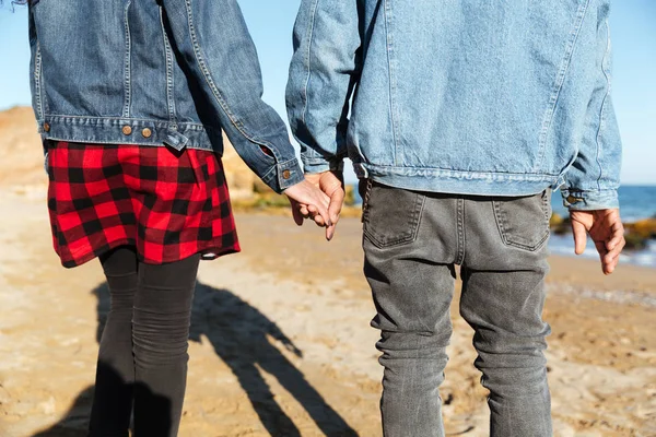 Cropped photo of african loving couple walking outdoors — Stock Photo, Image