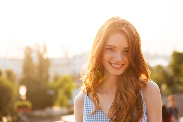 Happy pretty redhead girl with long hair — Stock Photo, Image