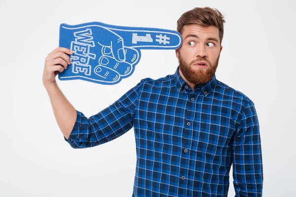 Pensive man looking at fan finger isolated — Stock Photo, Image