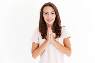 Eller gülümseyen esmer kadın Holding dua hareketi