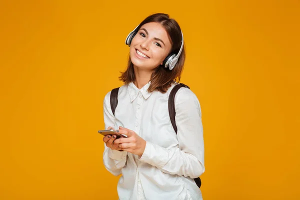 Portrait of a pretty teenage schoolgirl in uniform — Stock Photo, Image