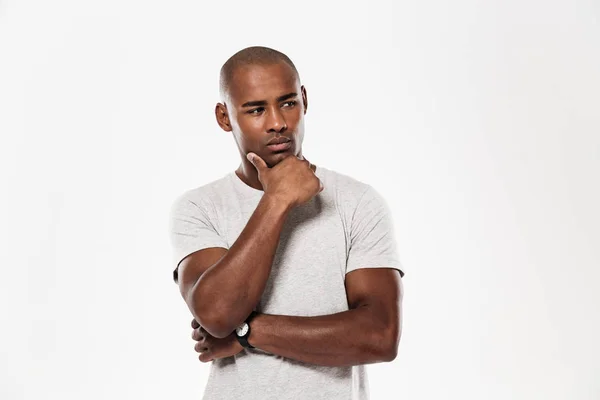 Serious young african man standing isolated — Stock Photo, Image