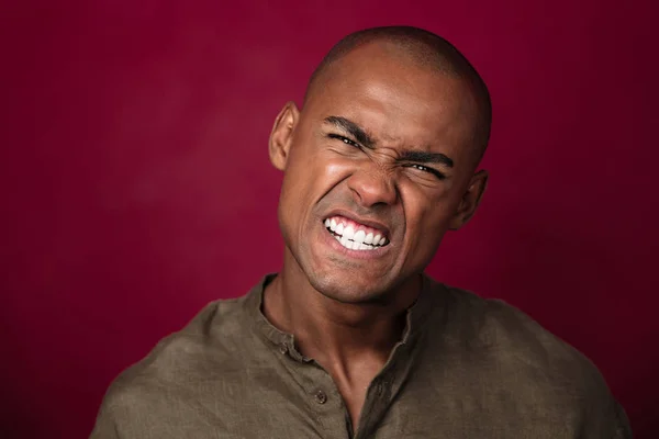 Close up portrait of angry african man looking at camera — Stock Photo, Image