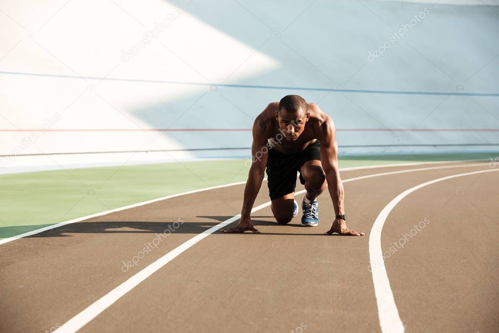 Portrait of a concentrated young afro american sportsman