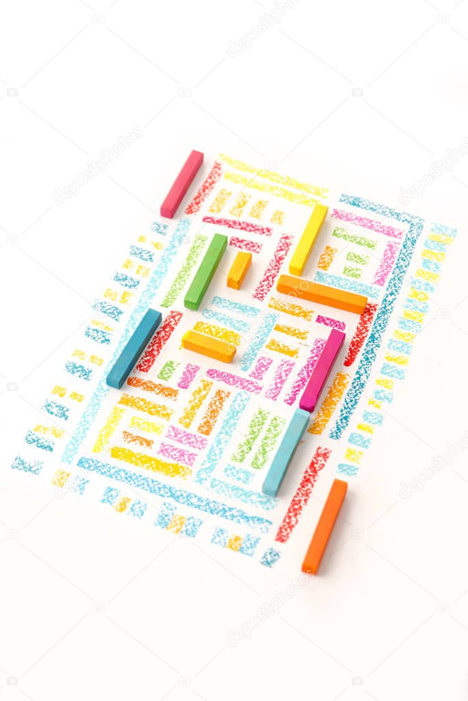Photo of a cute geometric pattern made of colorful pastel chalks